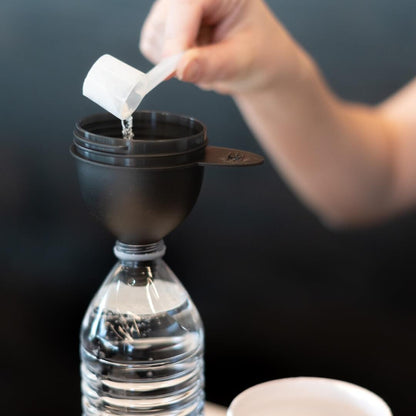 1st Phorm Gains Funnel attached to a water bottle