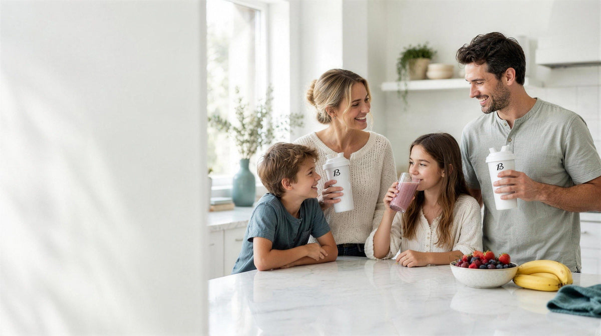 Family sharing B1st shakes and fresh fruit at a bright kitchen counter